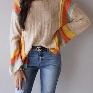 Trendy Cream Sweater with Vibrant Stripes